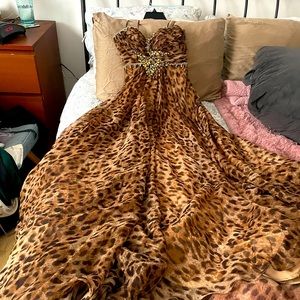 Strapless gown, worn once, leopard print with bust rushing and jewelled